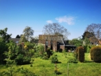 Gartenansicht Haus - Einzigartiges, architektonisches Highlight mit unverbaubarem Blick und Grundwasser-Wärmepumpe zu mieten