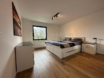 Schlafzimmer - Hochwertig sanierte 3-Zimmer-Wohnung -modernes Wohnen mit toller Aussicht auf die angrenzende Natur!